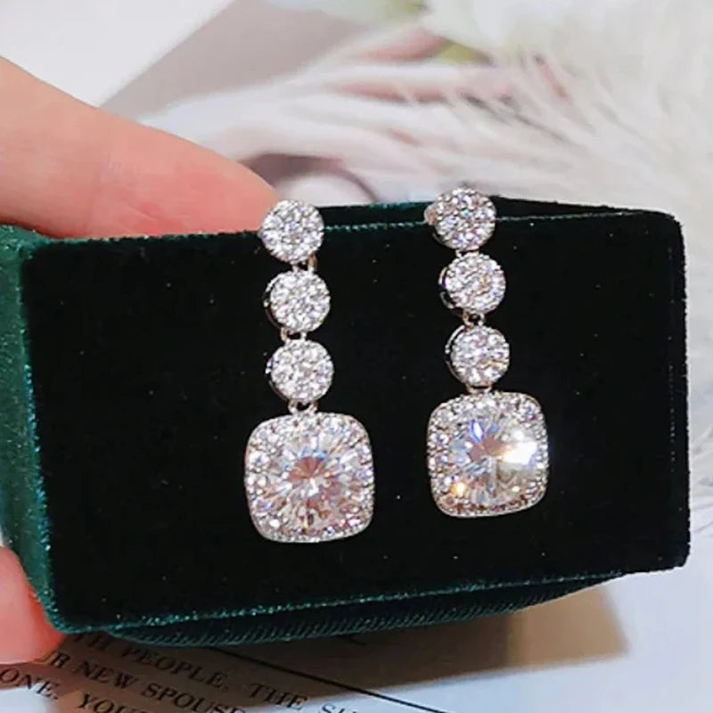 Pendientes colgantes de mujer brillantes con circonita