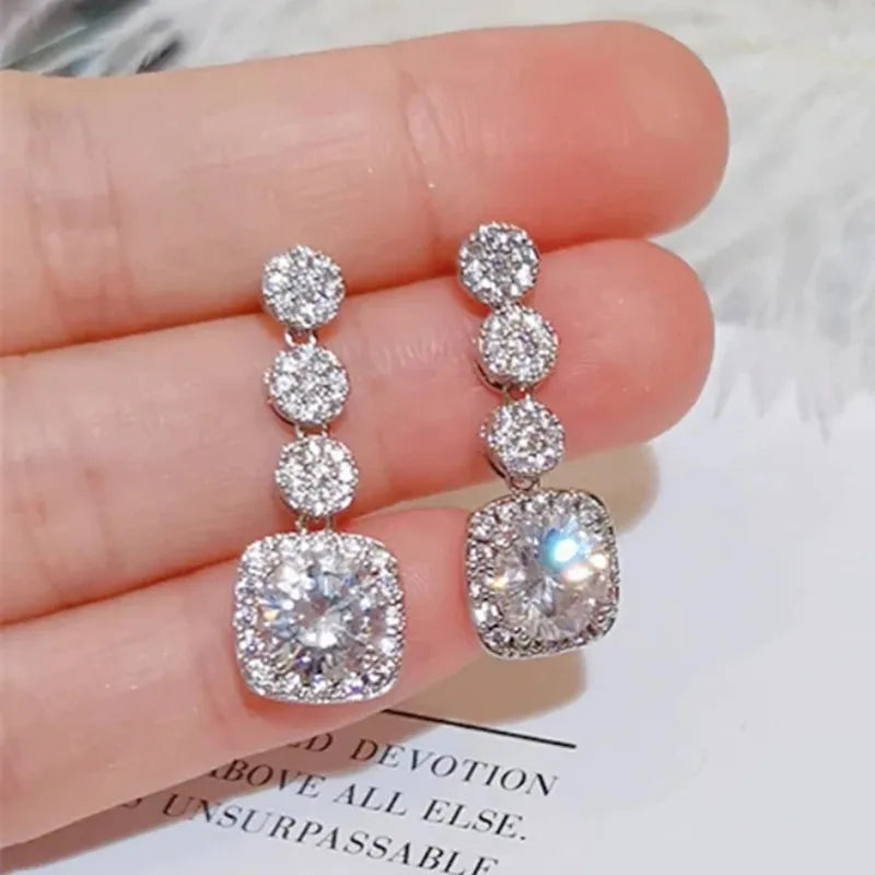 Pendientes colgantes de mujer brillantes con circonita