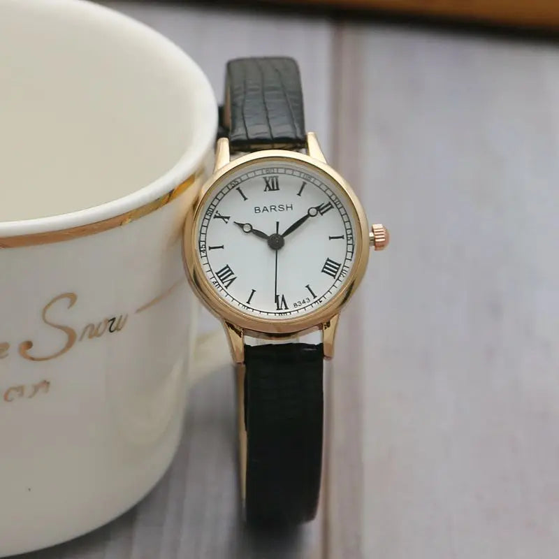 Reloj con correa de cuero para mujer